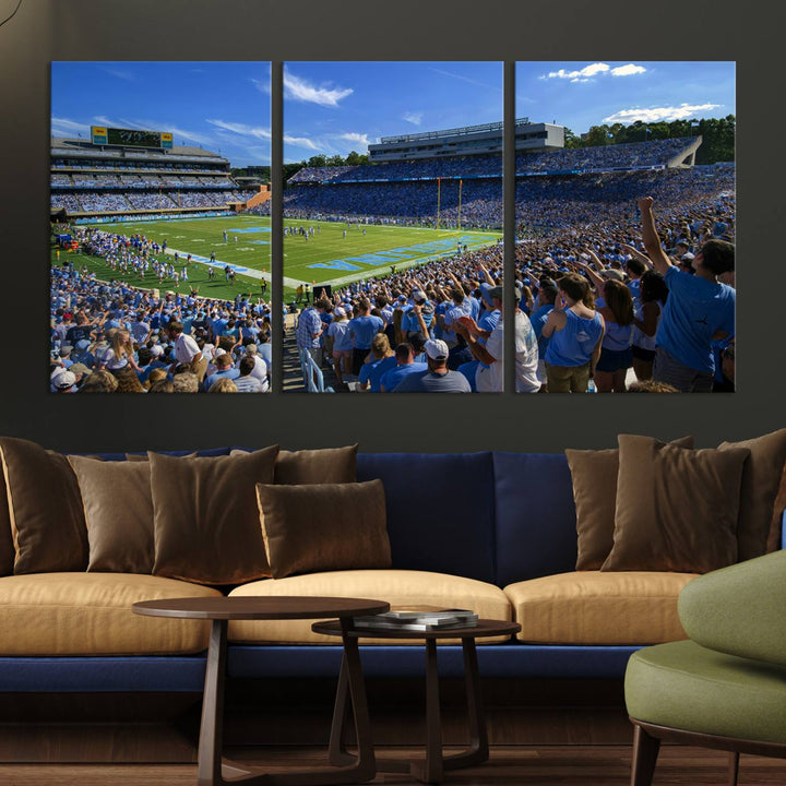 A gallery-quality canvas wall art print featuring the University of North Carolina Tar Heels Football Team and Chapel Hill's Kenan Memorial Stadium adorns the cafe wall.