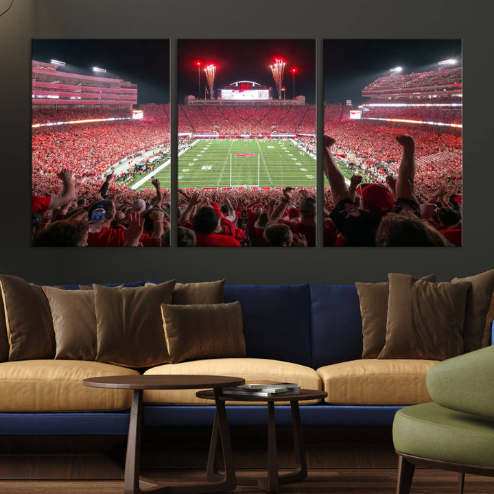 The University of Nebraska Cornhuskers Football Team Print, a vibrant three-panel canvas depicting Lincoln Memorial Stadium filled with enthusiastic fans from the end zone perspective, features a gallery-quality finish.