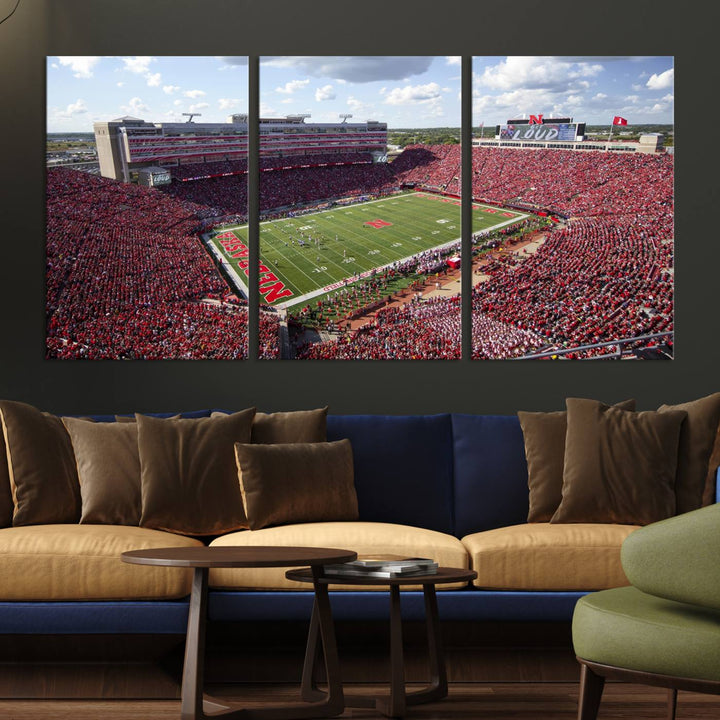 The University of Nebraska Cornhuskers Football Team Print showcases a vibrant triptych of Lincoln Memorial Stadium, depicting a packed football stadium filled with energetic fans. This handmade art piece is crafted in the USA and printed on premium canvas for a gallery-quality finish.