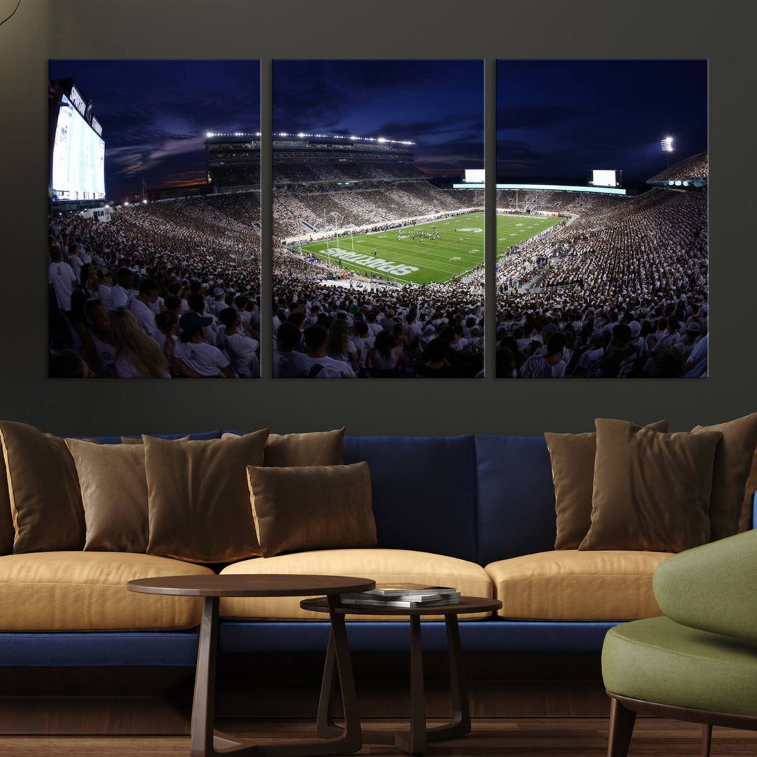 A packed football stadium at night, with bright lights and fans in white, depicted in a Michigan State Spartans Stadium wall art.