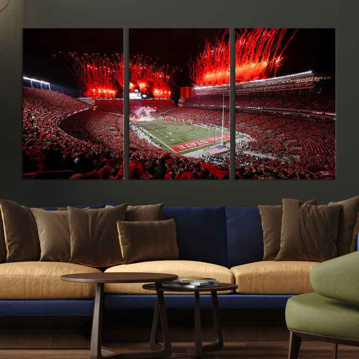 A vibrant red canvas art of a packed Ohio State Buckeyes stadium at night with fireworks.