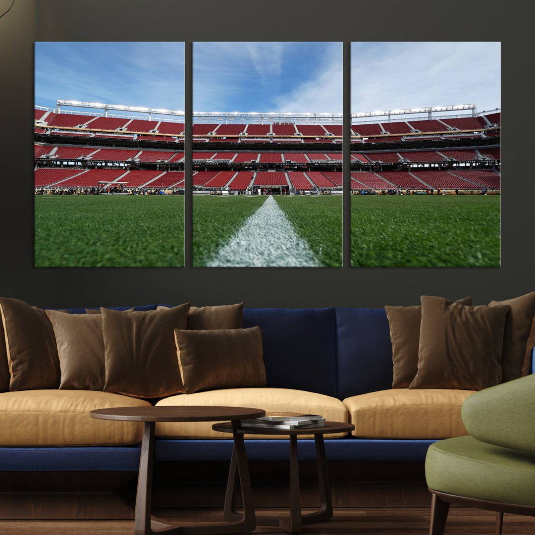 A canvas print of the University of Tulsa Golden Hurricane showcases H.A. Chapman Stadiums football field and red seats against a backdrop of a blue sky.