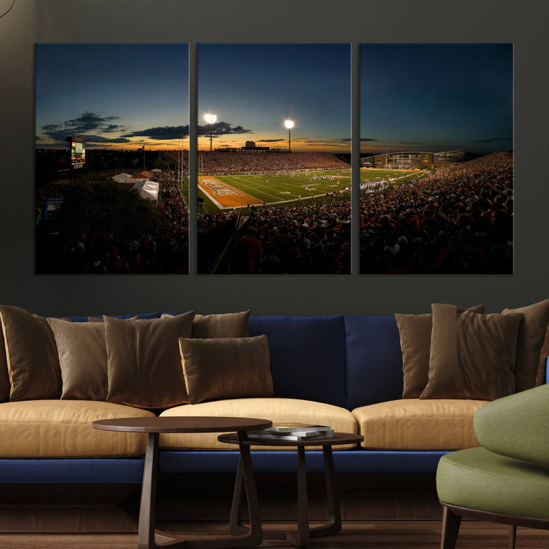 Ball State Cardinals Football Team Print - Muncie Scheumann Stadium Canvas featuring a sunset, floodlights, and lively crowd.