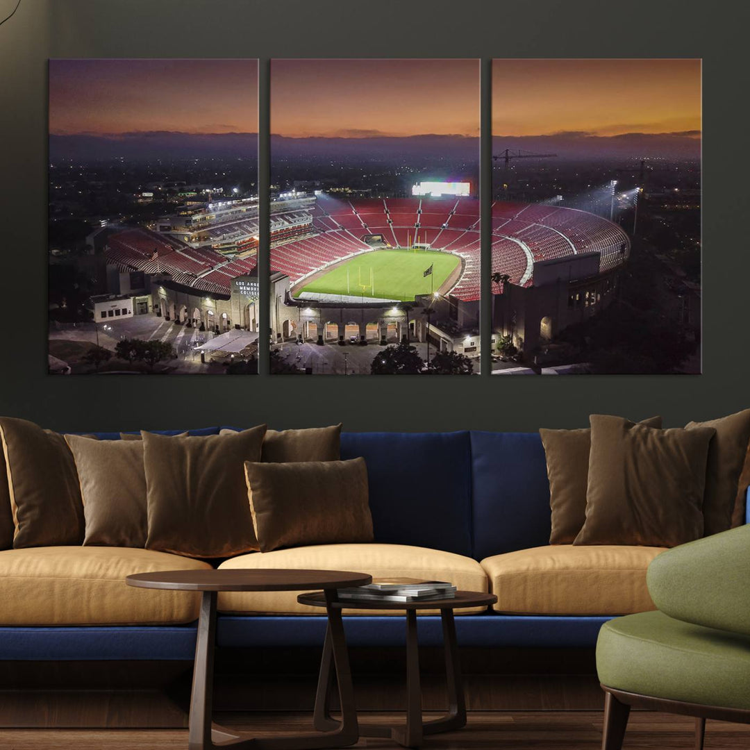 The USC Trojans Stadium canvas captures Memorial Coliseum at twilight, showcasing red seats and a green field beneath an orange sky.