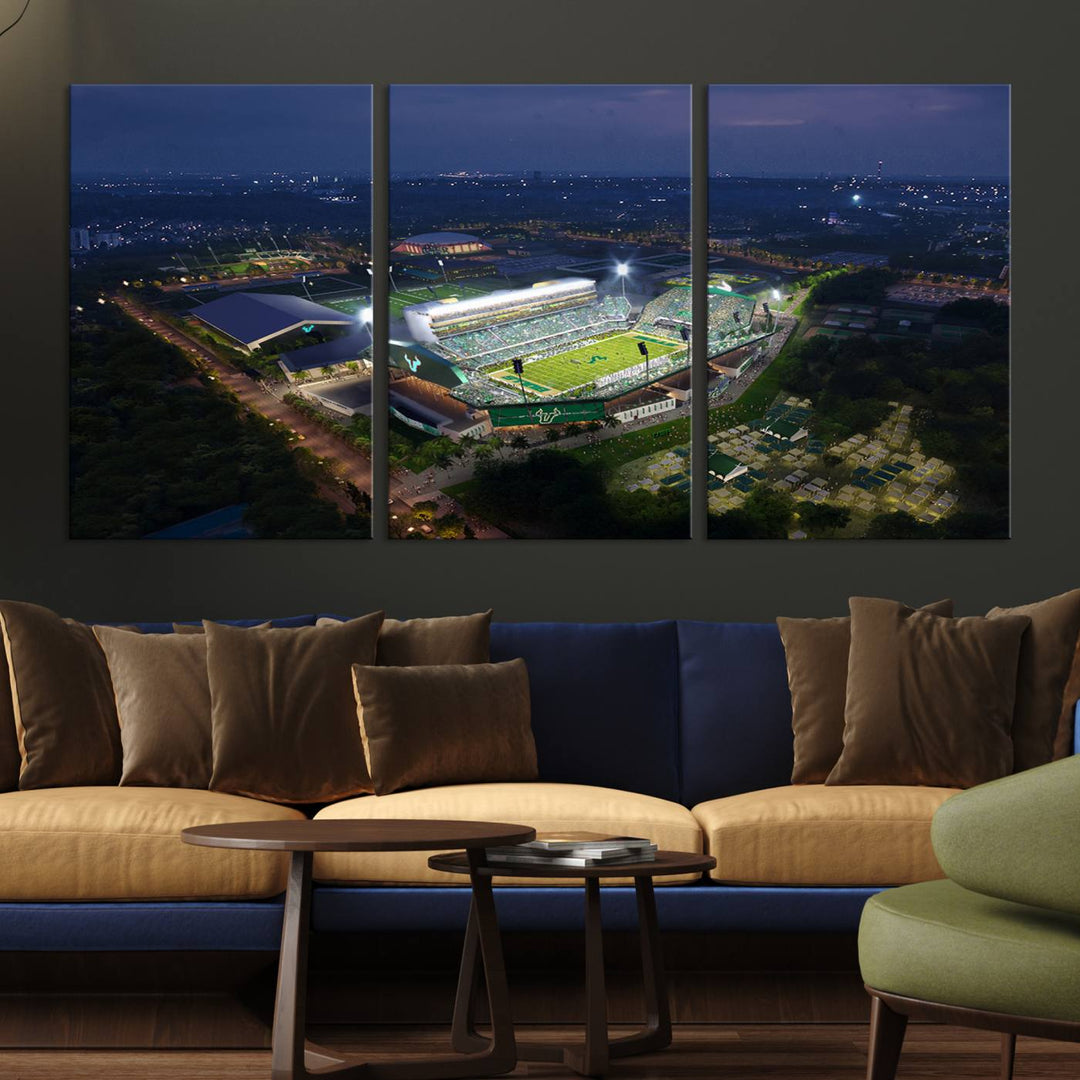 The USF Bulls Football Team Wall Art Canvas Print showcases the Tampa USF Football Stadium at night with city lights.