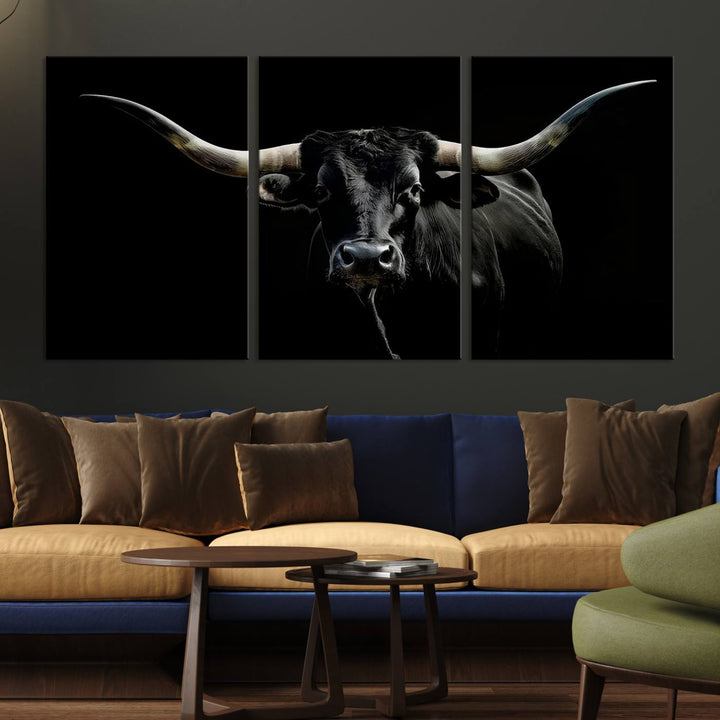 The Texas Black Longhorn Bull Canvas Print, featuring large curved horns set against a dark background, is ideal for Western decor.