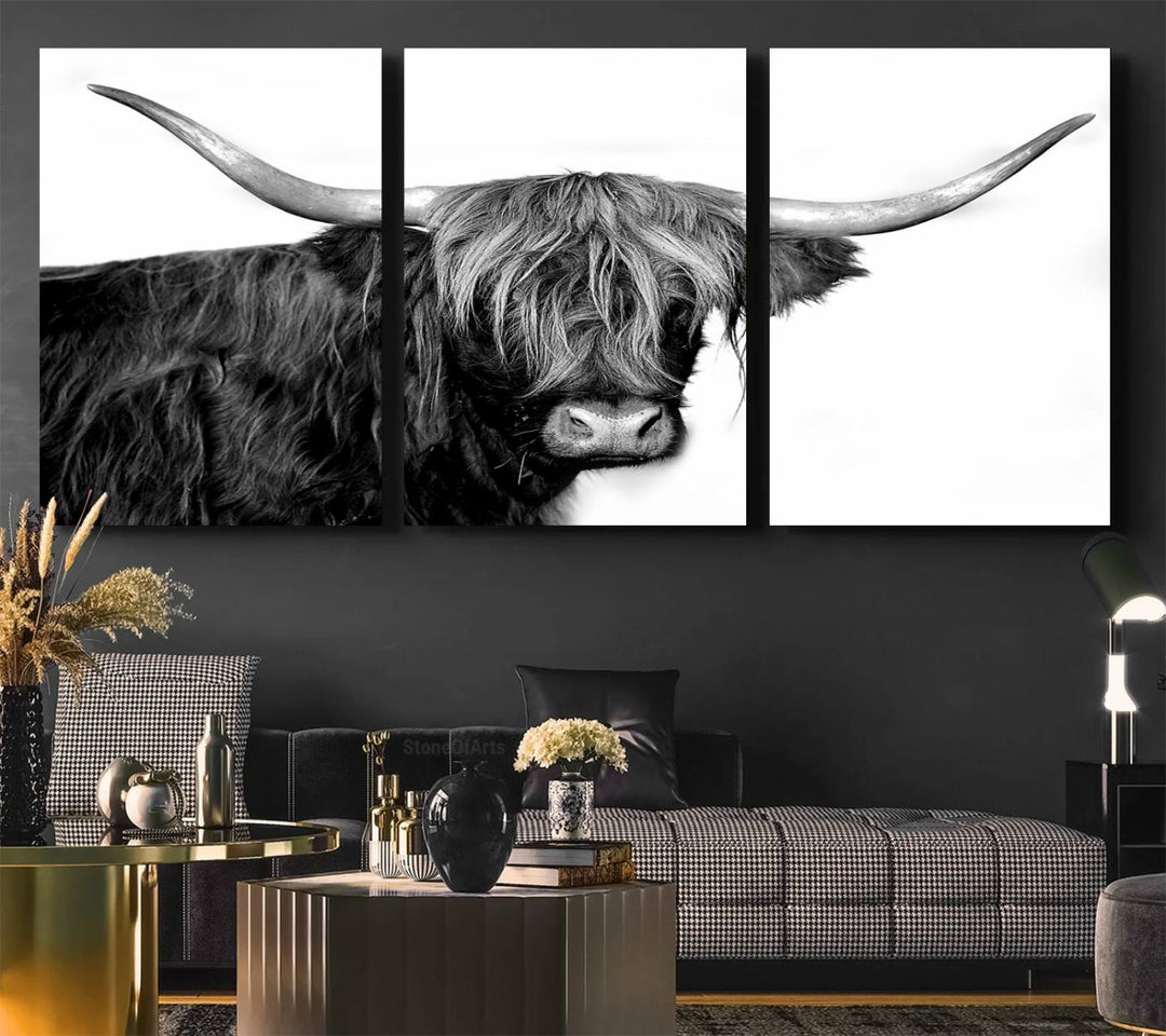 The Black and White Highland Cow Multi Panel Wall Art Canvas Print with UV-protection hangs prominently.