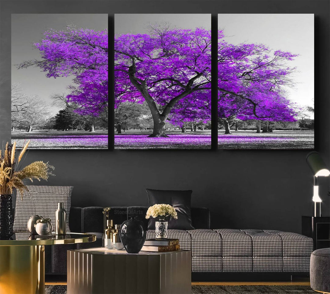 The Big Purple Tree Wall Art Canvas Print showcases a vibrant purple tree set against a black-and-white landscape.