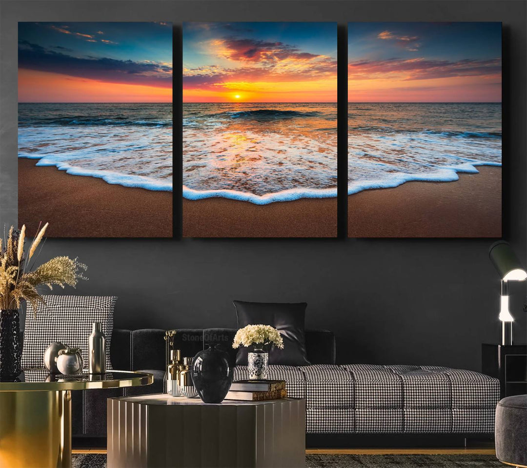 A Sunset with Calm Waves on the Beach Wall Art Canvas Print adorns the dining room.