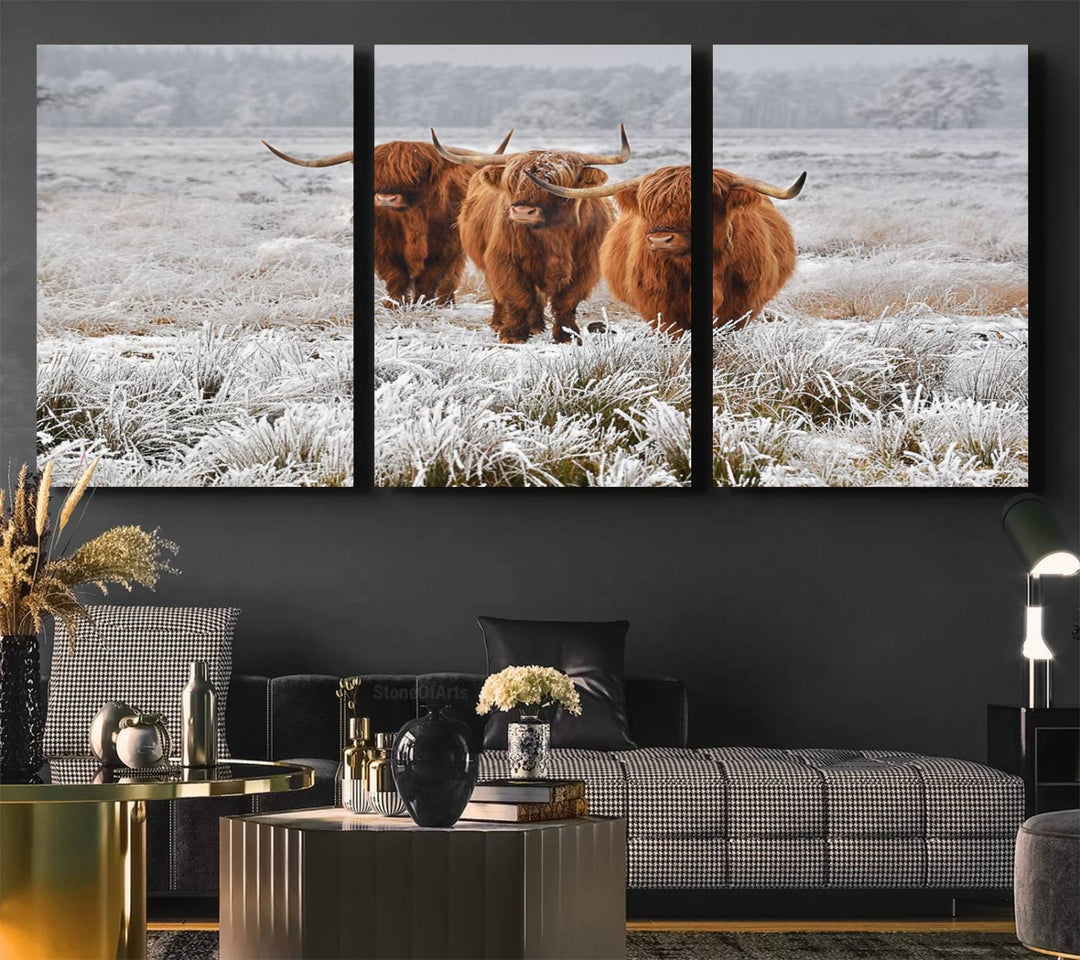 The Highland Cows in Snow canvas showcases three cattle in a frosty field.