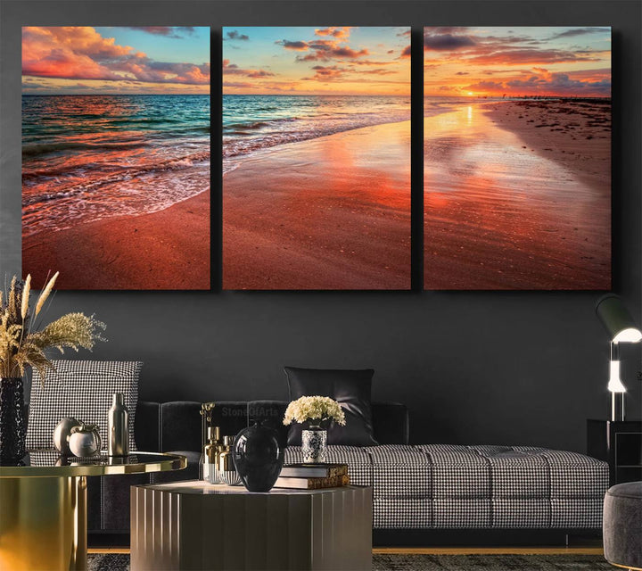 A Vibrant Sunset Beach Canvas Print with ocean waves and sandy shoreline enhances coastal-themed interiors.