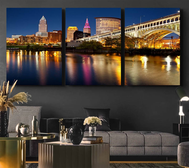 Cleveland Night Skyline Canvas: Cityscape with an illuminated bridge reflecting on calm water.