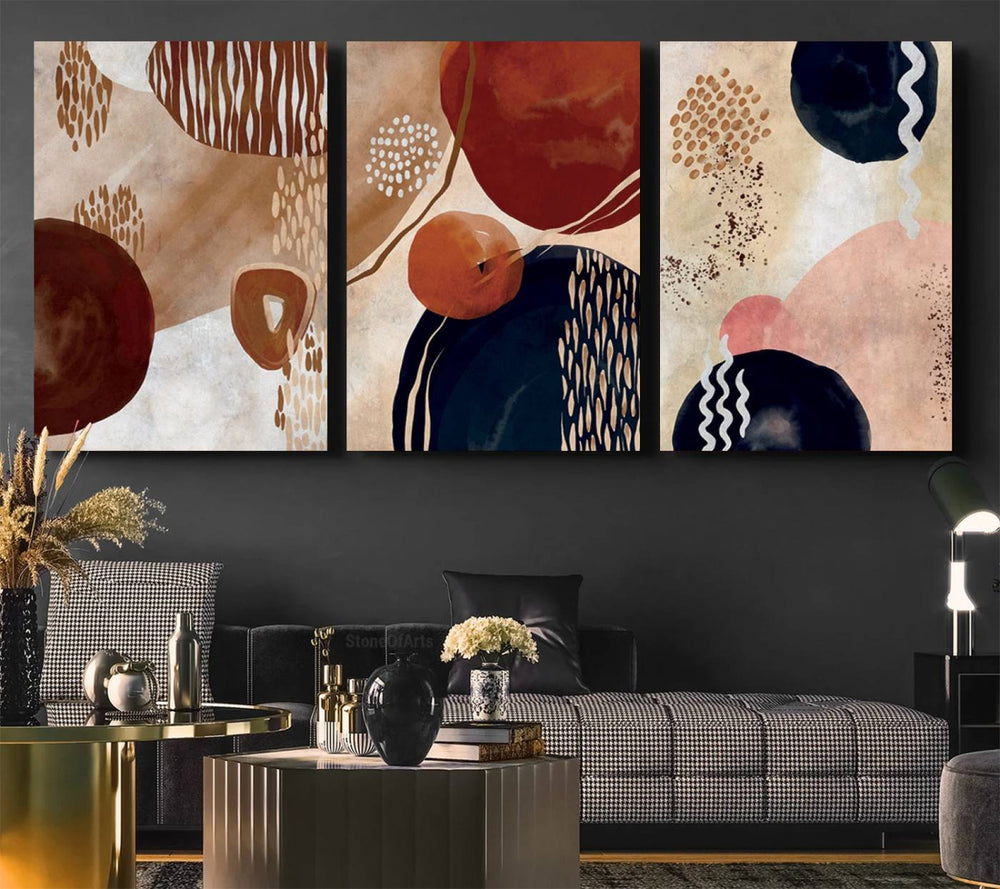 The Boho Neutral Canvas Print Set with earthy tones and circles hangs on the wall.