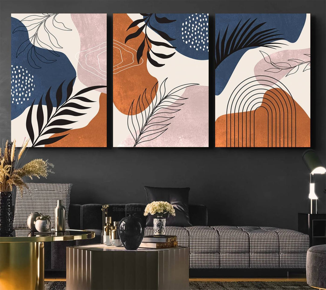 Boho Wall Art Canvas Print Set showcases mid-century geometric and leaf motifs in blue, ochre, and pink.