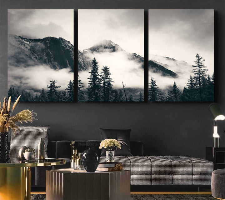 A large foggy mountain forest canvas print hangs prominently in the room.