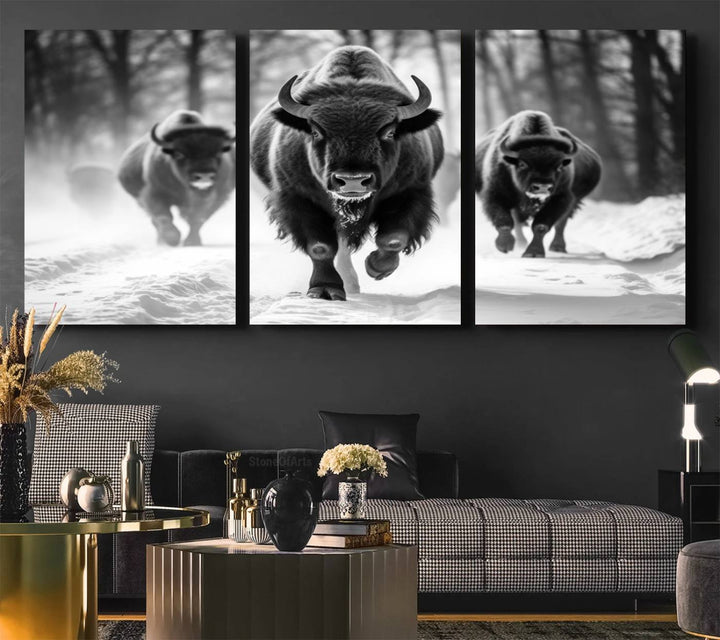 The Buffalo Wall Art Canvas Print of bison running through snow adorns the wall.