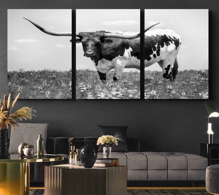 Texas Black White Highland Longhorn Cow Wall Art Canvas displayed on the wall.