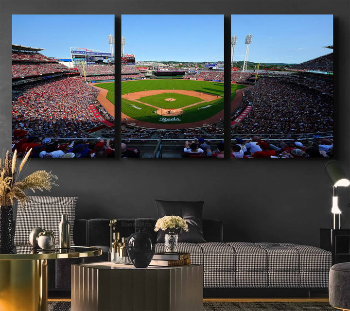 The Cincinnati Reds Baseball Team print of Great American Ball Park Stadium adorns the wall.