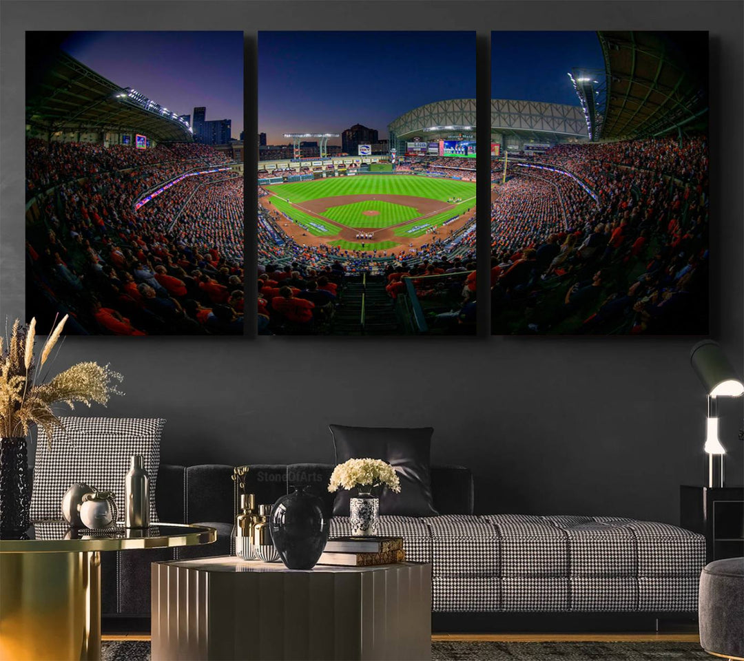 A canvas print of Houston Minute Maid Park at dusk is mounted on the wall.