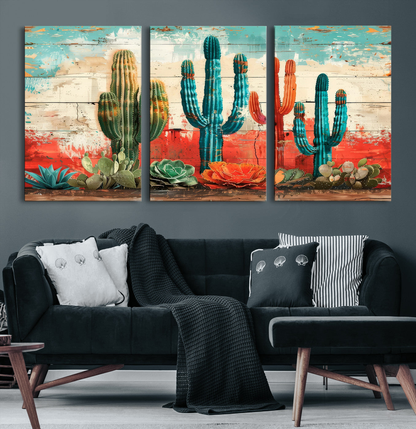 A vivid southwestern-style artwork featuring an eclectic mix of cacti and succulents painted against a textured, rustic wood backdrop in rich turquoise, red, and orange hues.