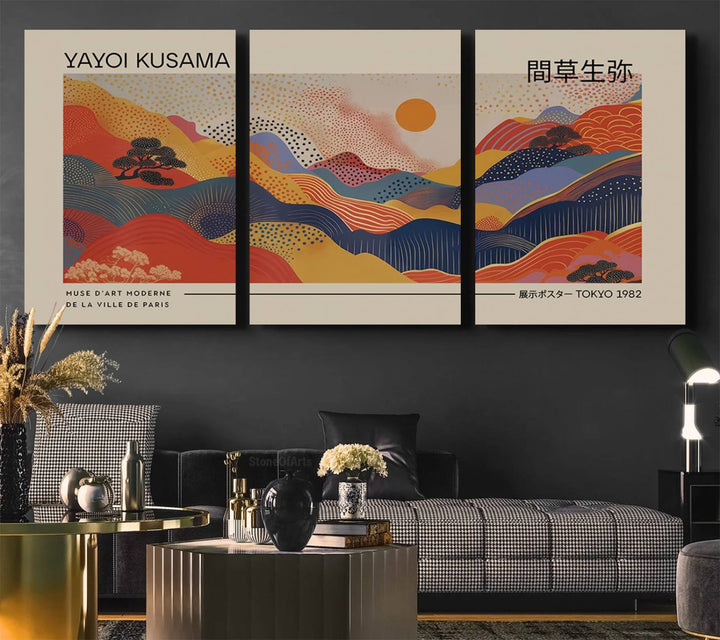 The Yayoi Kusama vibrant landscape canvas print featuring abstract mountains and a sun enhances the space with its modern aesthetic.