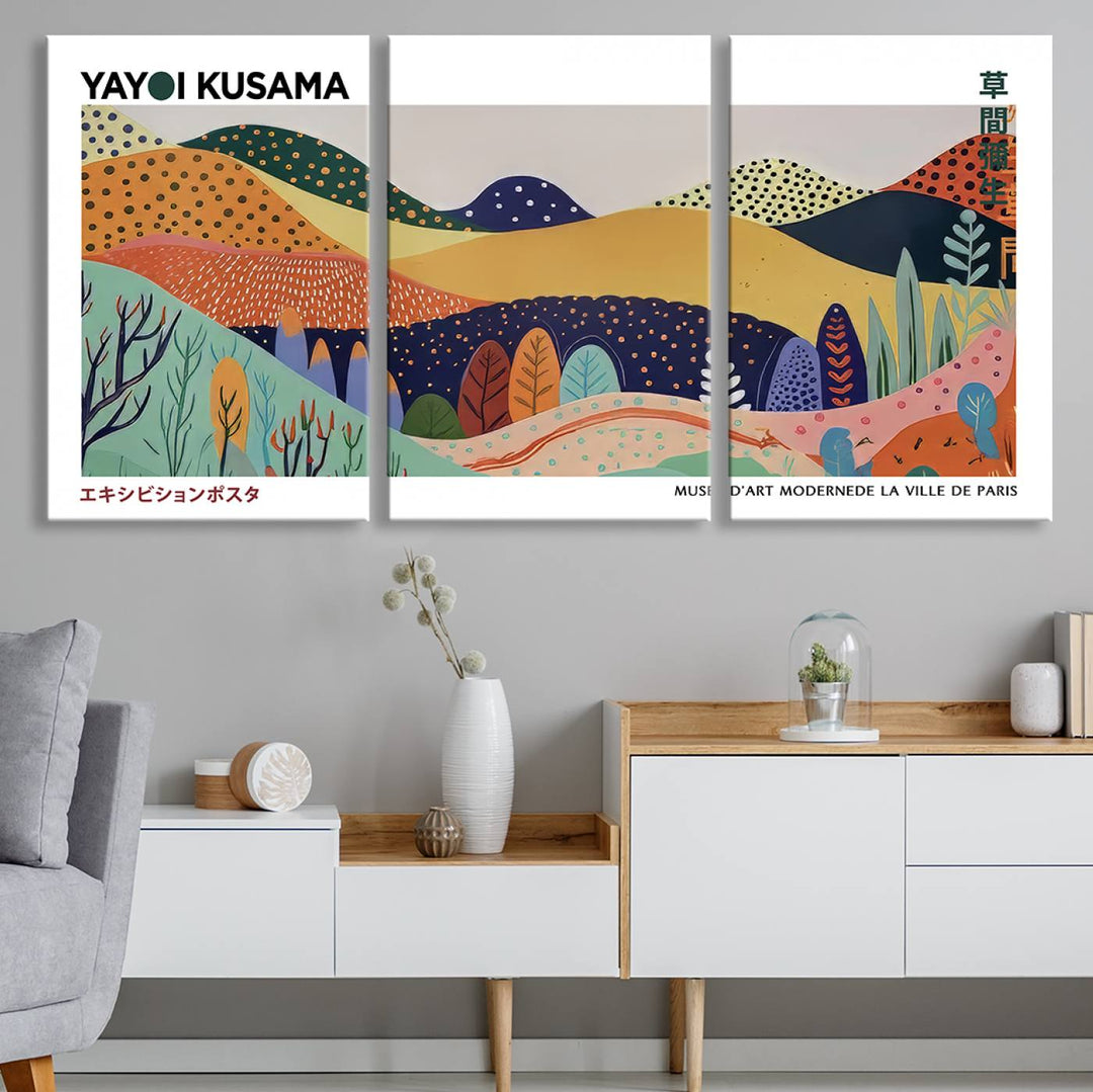 A triptych featuring the Framed Yayoi Kusama 1986 Wall Art Print hangs above. This Japanese Wabi Sabi inspired piece, rich in vibrant abstract landscapes, adds an elegant touch to any nature-inspired décor.