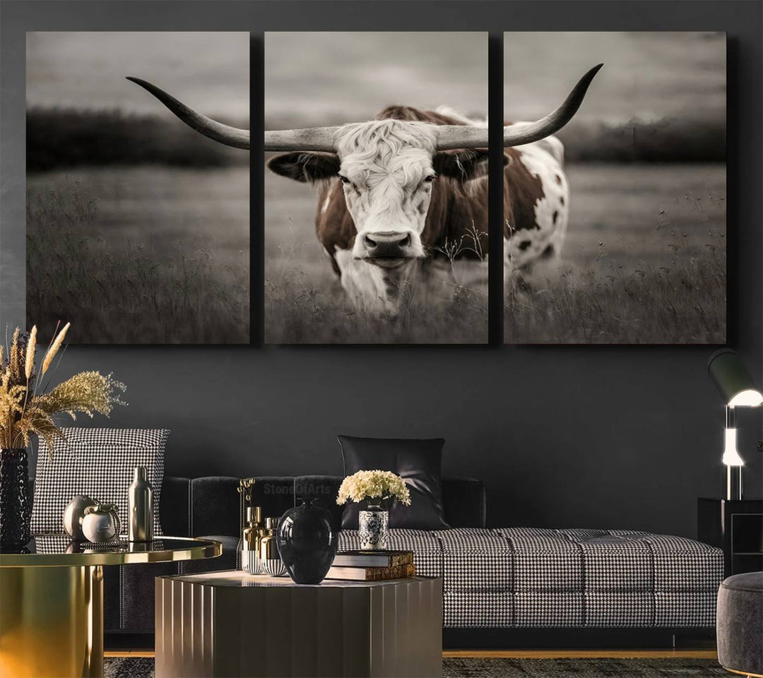 The Texas Longhorn Cow Canvas Wall Art Print adds a rustic touch to a living room.