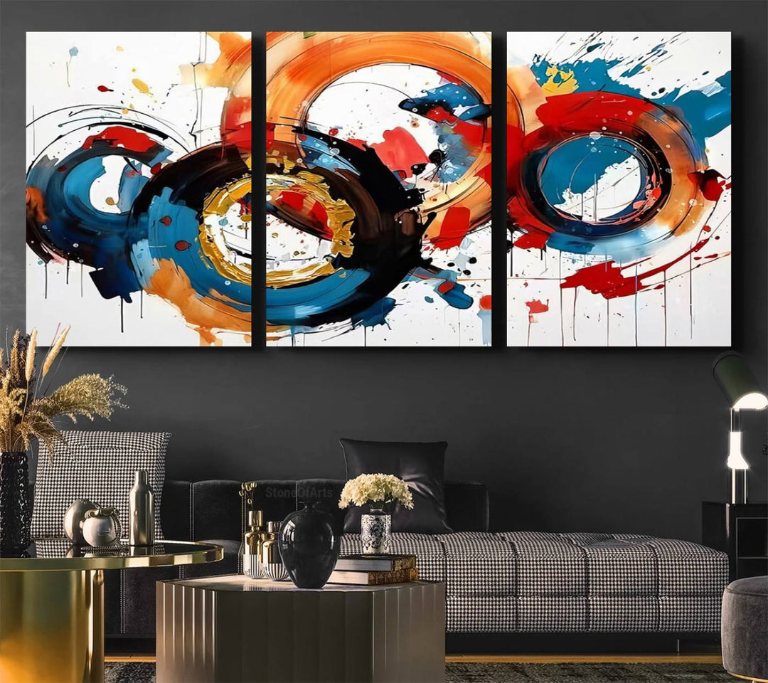 The Abstract Wall Art Rings Canvas Print, with its bold and colorful circular strokes, adorns the wall, epitomizing contemporary design.