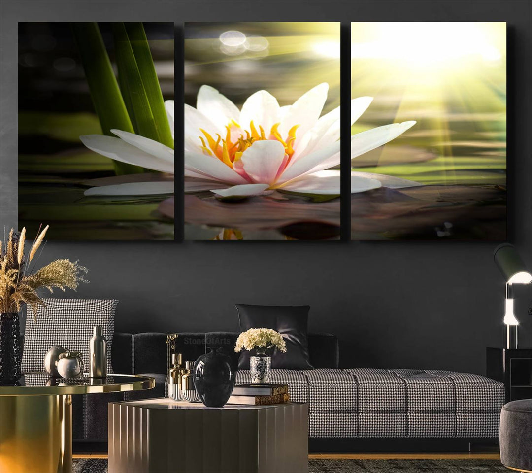 The Lotus Flower Wall Art Canvas Print showcases a white water lily with a yellow center floating gracefully in sunlight.