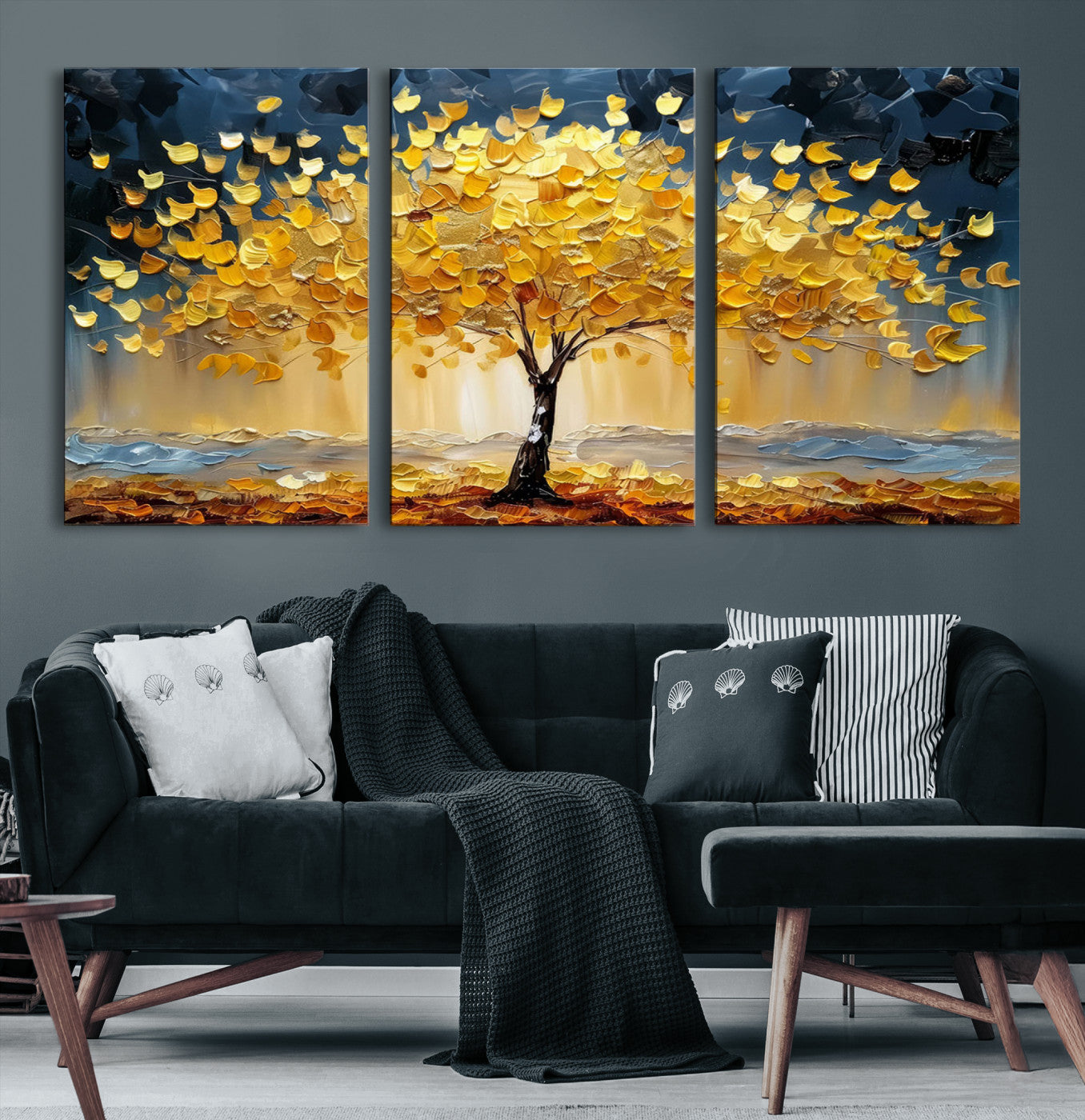 Canvas of a golden autumn tree with textured brushstrokes and moody blue skies, perfect for dramatic and vibrant home decor.