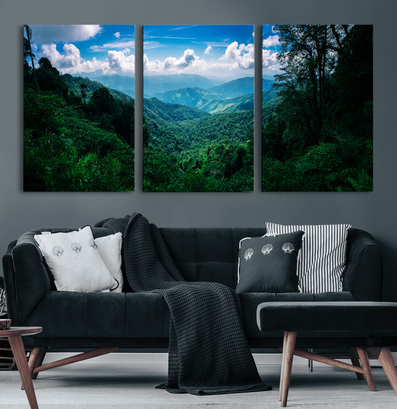 Canvas of a misty tropical jungle with vibrant greenery and layered blue mountains, ideal for exotic nature-themed wall décor.
