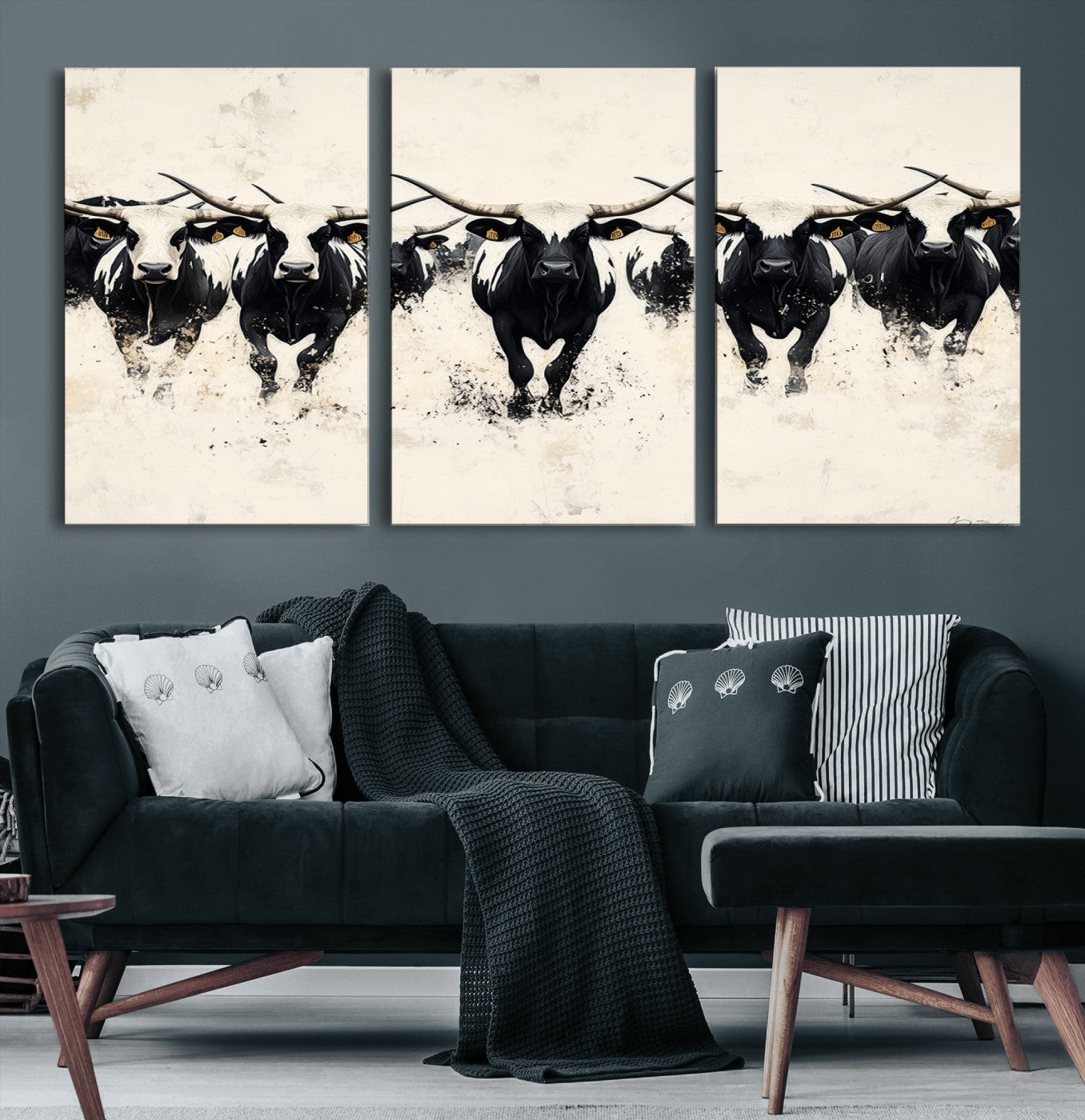 Canvas artwork of black and white Texas longhorns in a bold stampede over a minimalist background, ideal for rustic modern or Western-themed decor.