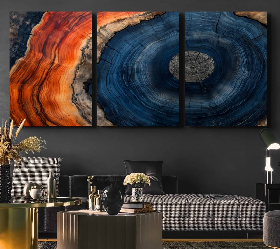 Abstract Tree Ring Wall Art Print on canvas featuring vibrant blue, orange, and brown rings with a natural rustic wood texture. Free shipping available!.