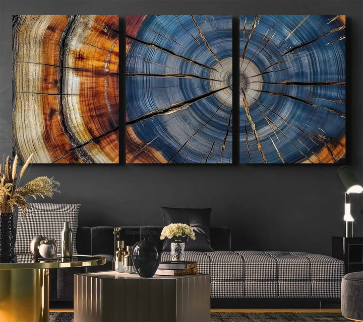 Close-up of blue, brown, and orange wood grain rings on the Abstract Tree Rings Canvas Wall Art Print.