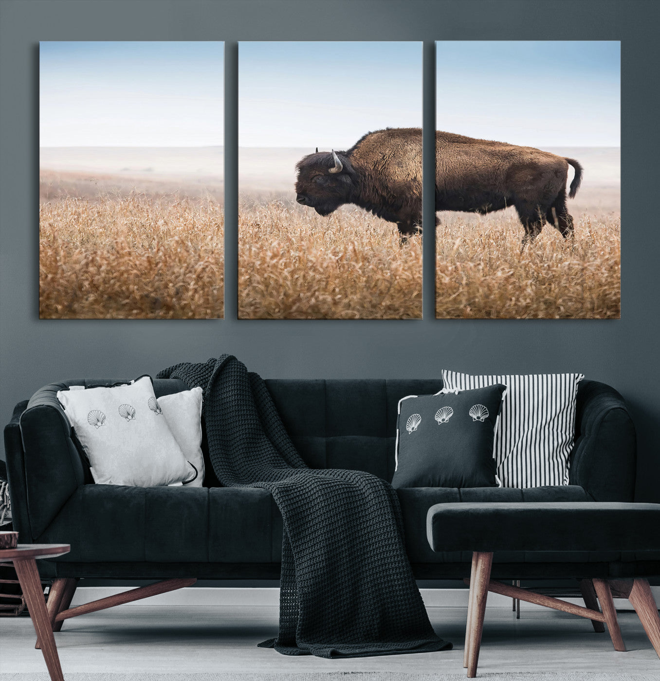 A solitary American bison stands in a dry grassland under soft skies, ideal for rustic or western-style home decor in warm neutral tones.