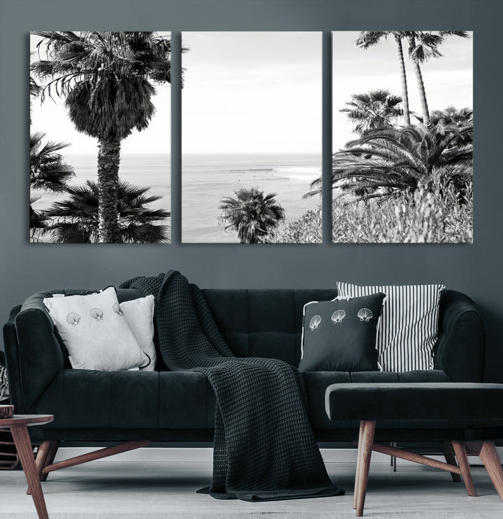 Monochrome canvas of palm trees framing a coastal surf scene, perfect for California-inspired or retro black-and-white beach decor.