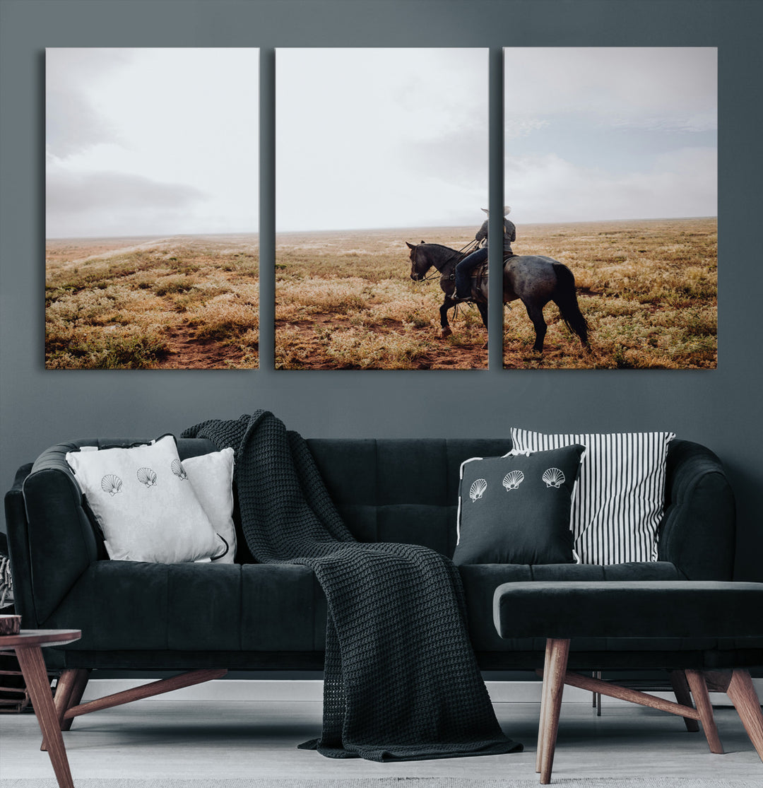 A lone cowboy riding horseback across an open prairie under a vast sky, capturing the rugged and timeless spirit of the Western frontier.