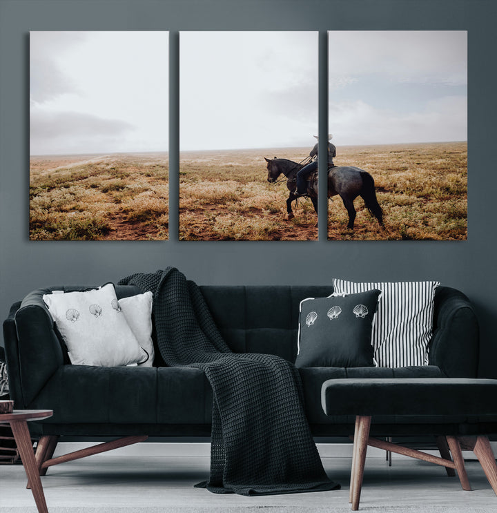 A lone cowboy riding horseback across an open prairie under a vast sky, capturing the rugged and timeless spirit of the Western frontier.