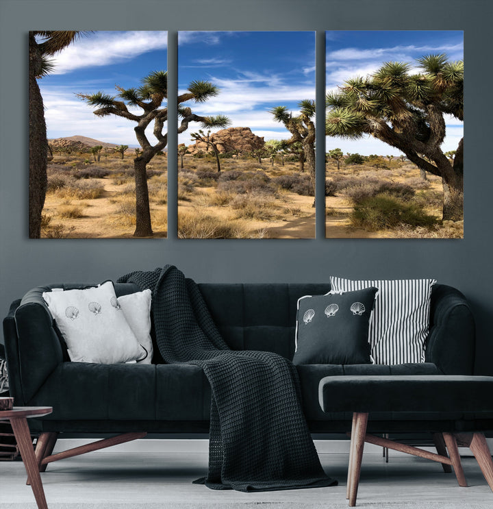 Scenic Joshua Tree landscape with rugged desert terrain, golden dry grass, and a deep blue sky, creating a warm, rustic Southwestern aesthetic.