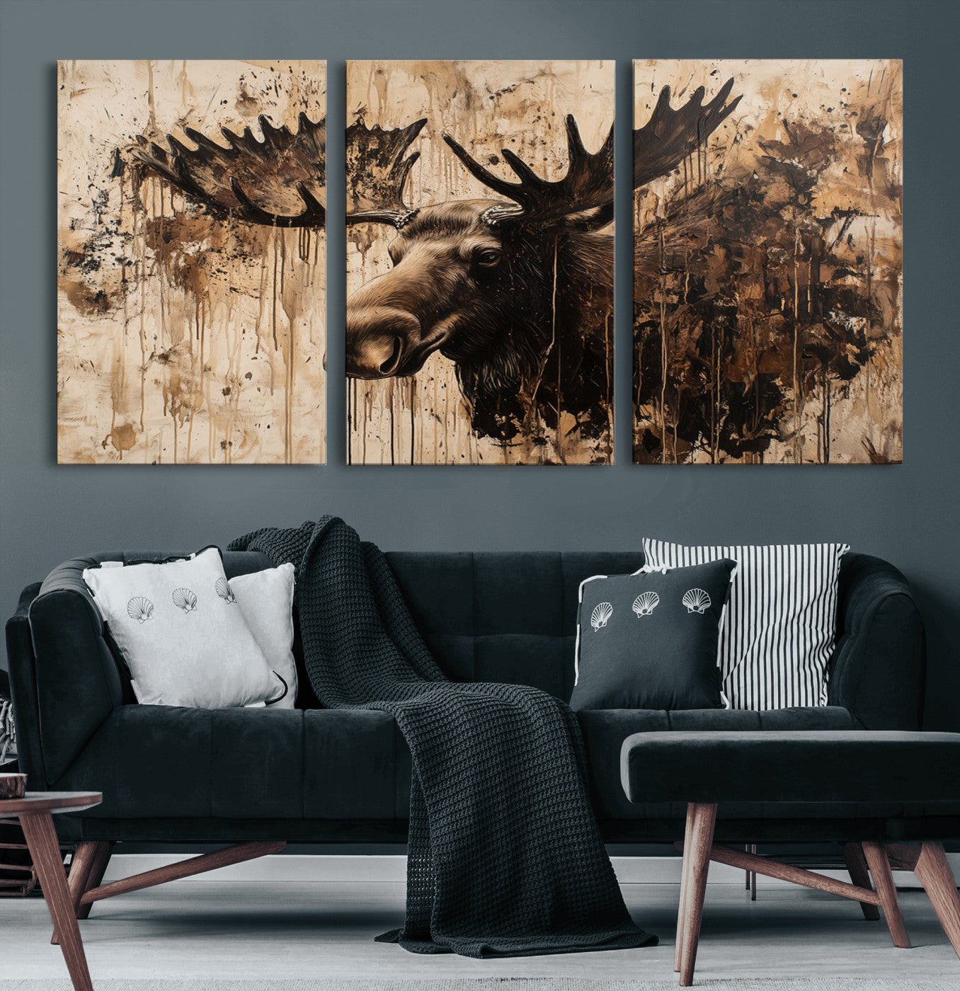 Artistic painting of a moose head with large antlers in shades of brown and black, with paint splatters and drips on a beige textured background, creating a rustic and expressive wall art canvas.