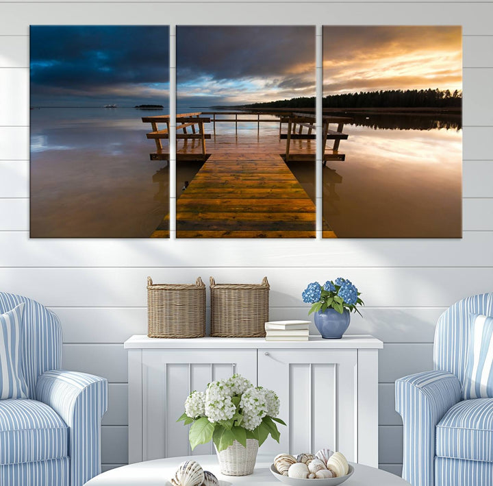 The "Serene Lake Pier at Sunset" landscape canvas print, crafted as ready-to-hang and framed wall art, enriches the contemporary setting by capturing the tranquility of a lakeside pier at sunset.