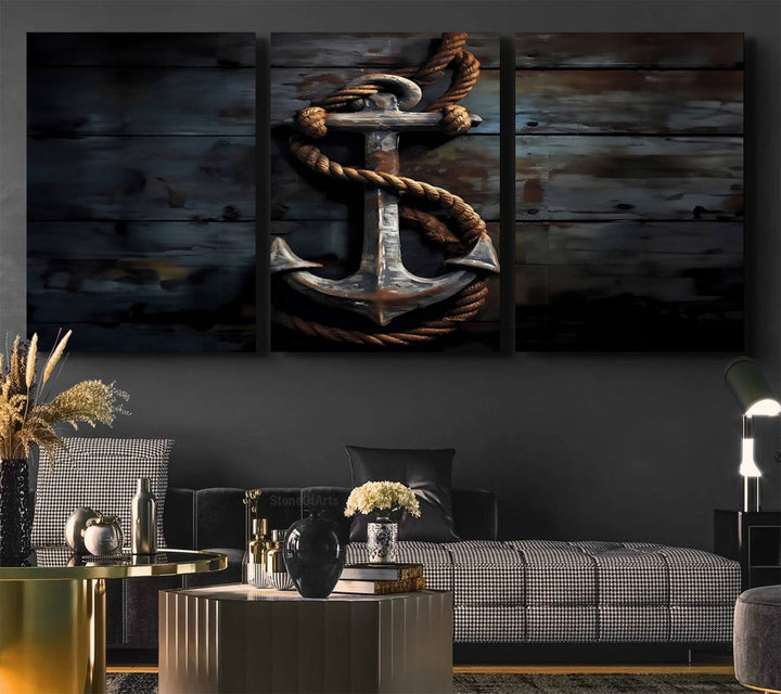 A "3 Panel Grunge Abstract Anchor Wall Art Canvas Print Set" adorns the wall, showcasing an anchor wrapped with rope. This museum-quality canvas boasts high-resolution printing and is professionally hand-assembled, elevating any space with elegance and artistic flair.