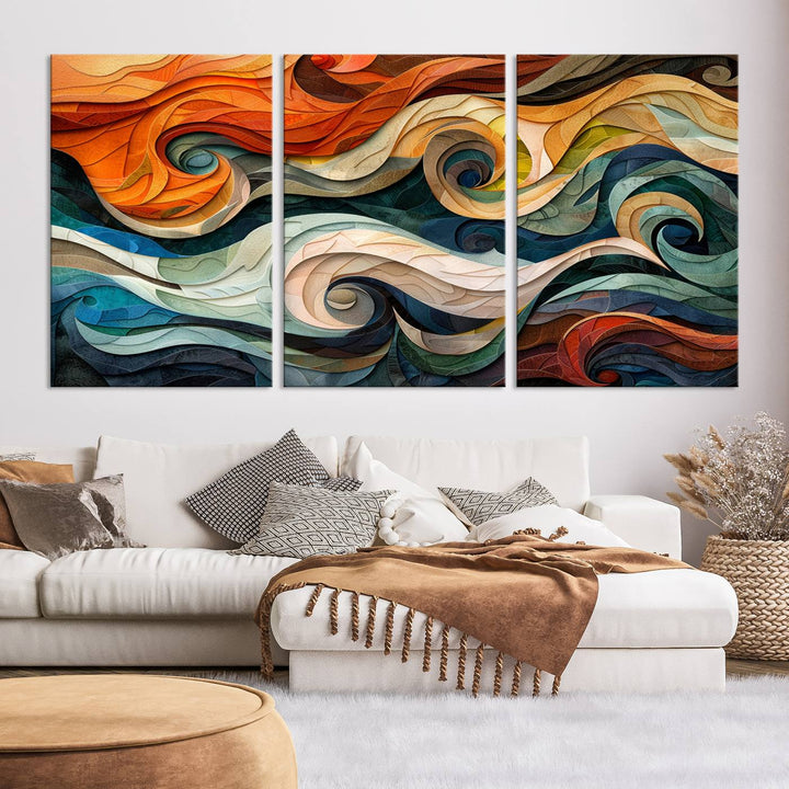 Abstract Wave Wall Art is a ready-to-hang framed canvas print featuring swirling orange, blue, and white patterns. It's perfect for adding vibrant decor to modern spaces.