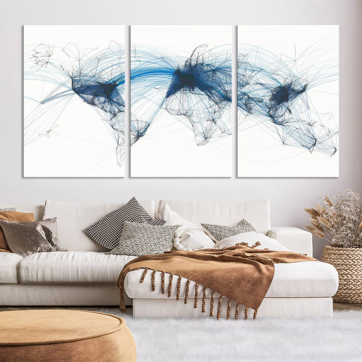 The Aviation Flight Map Wall Art is a set of three abstract panels featuring a world map with blue lines, resembling a flight map. Ideal for aviation enthusiasts, this ready-to-hang framed air traffic art print enhances the appeal of modern decor.