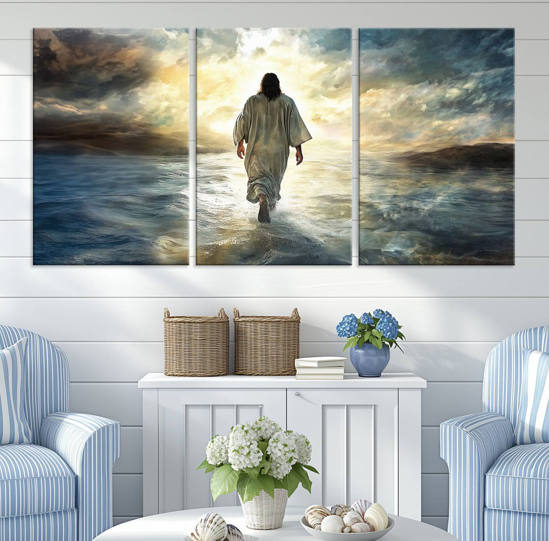 The Jesus Walking on Water Wall Art, a captivating triptych canvas print, showcases a person walking on water beneath dramatic clouds. This ready-to-hang piece seamlessly combines faith and style for your Christian home decor.