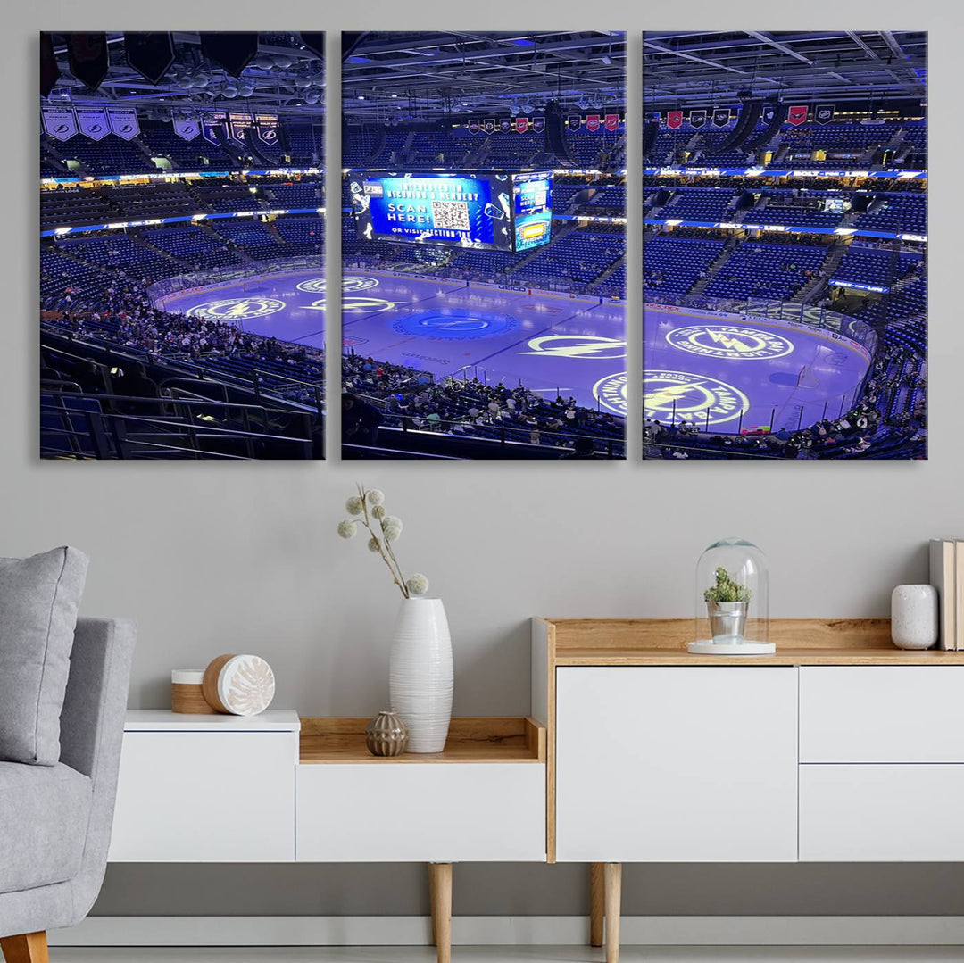 The wall art canvas print at Amalie Arena features team logos on ice, encapsulating the vibrant atmosphere of an NHL hockey stadium.