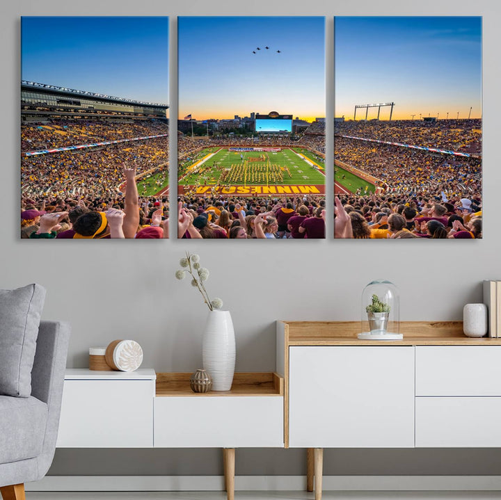 Canvas wall art featuring the University of Minnesota Football Team print, showcasing Huntington Bank Stadium at sunset with jets overhead.