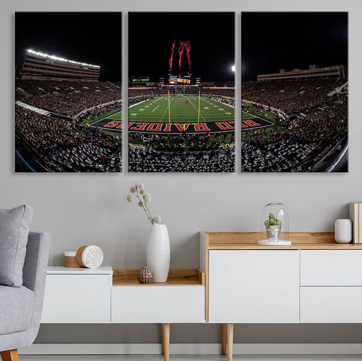 The wall features a Texas Tech Red Raiders Football Team Print on canvas, showcasing fireworks over a packed stadium at night.