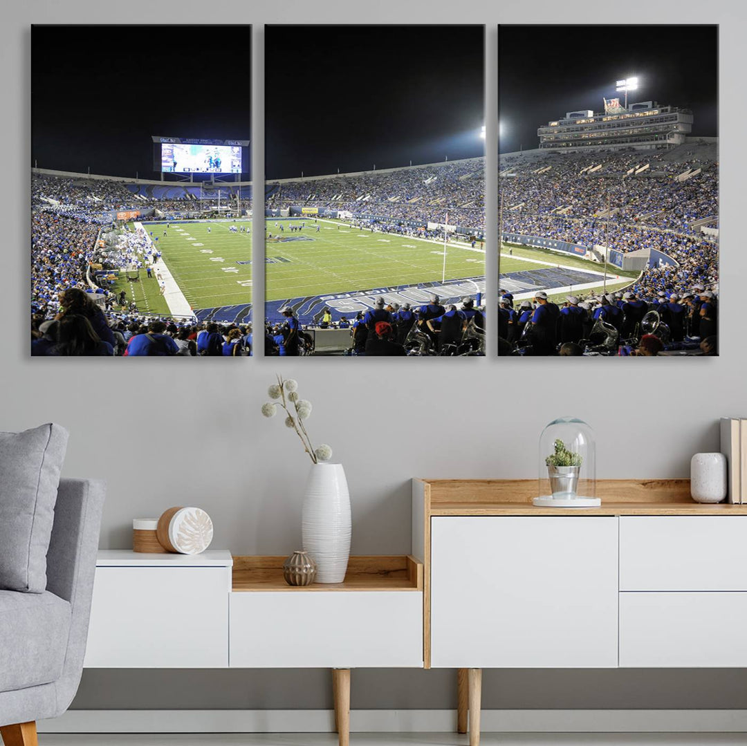 A vibrant depiction of Liberty Stadium at night, highlighting a Tigers football game on the large screen with stands filled with enthusiastic fans.