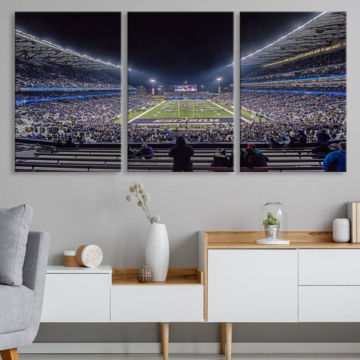 A canvas print titled The University of Washington Huskies Football depicts a packed Husky Stadium at night, as seen from the stands.